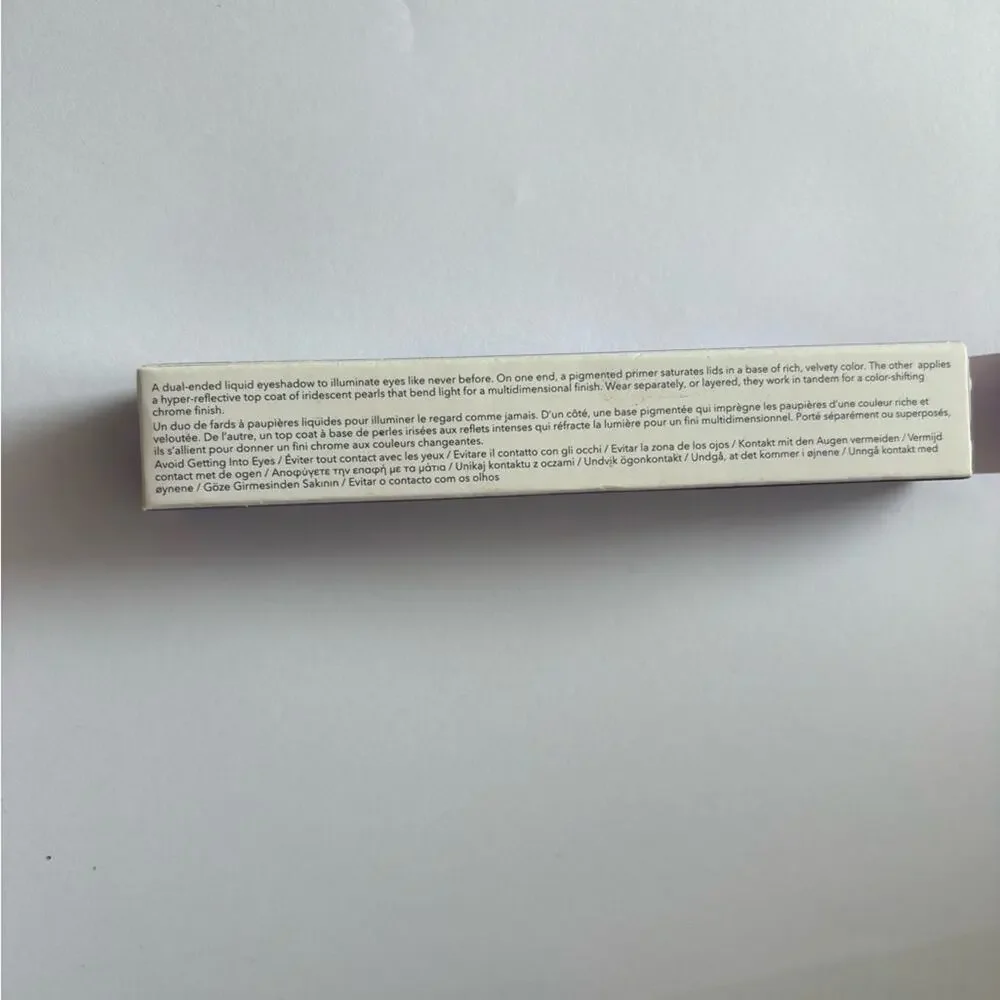 NWT becca light gleam liquid eye shadow primer and topper in shade laser